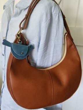 Portland Leather Tan Leather Crescent Shoulder Bag with Teal Bird Charm